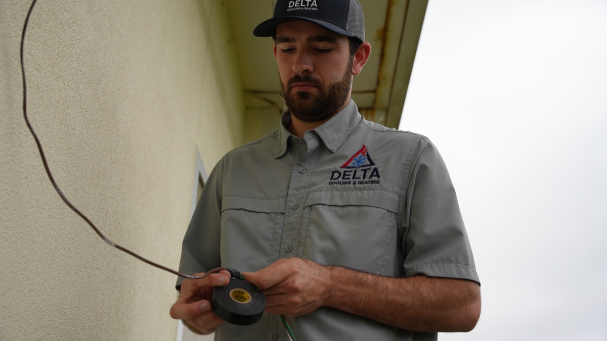 Delta Cooling technician on emergency HVAC service call